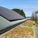 Cohousing parking structure with solar and ecoroof